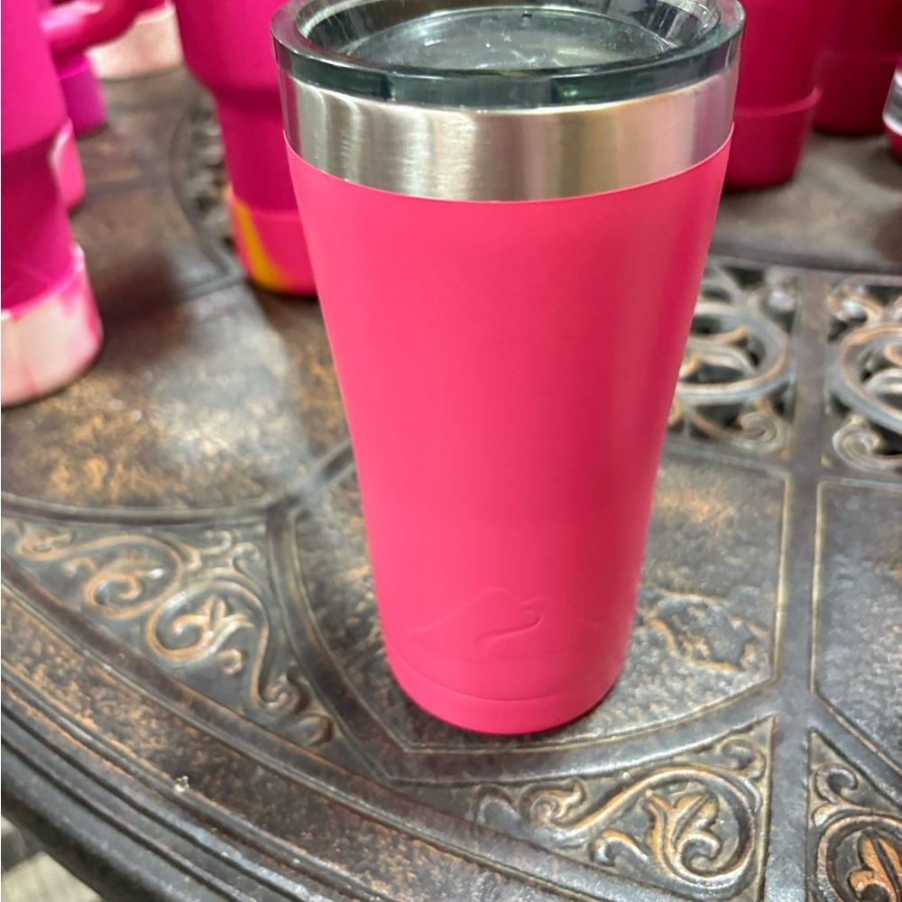 Ozark trail 16 oz, insulated tumbler with sip cap, is pink in color, EUC